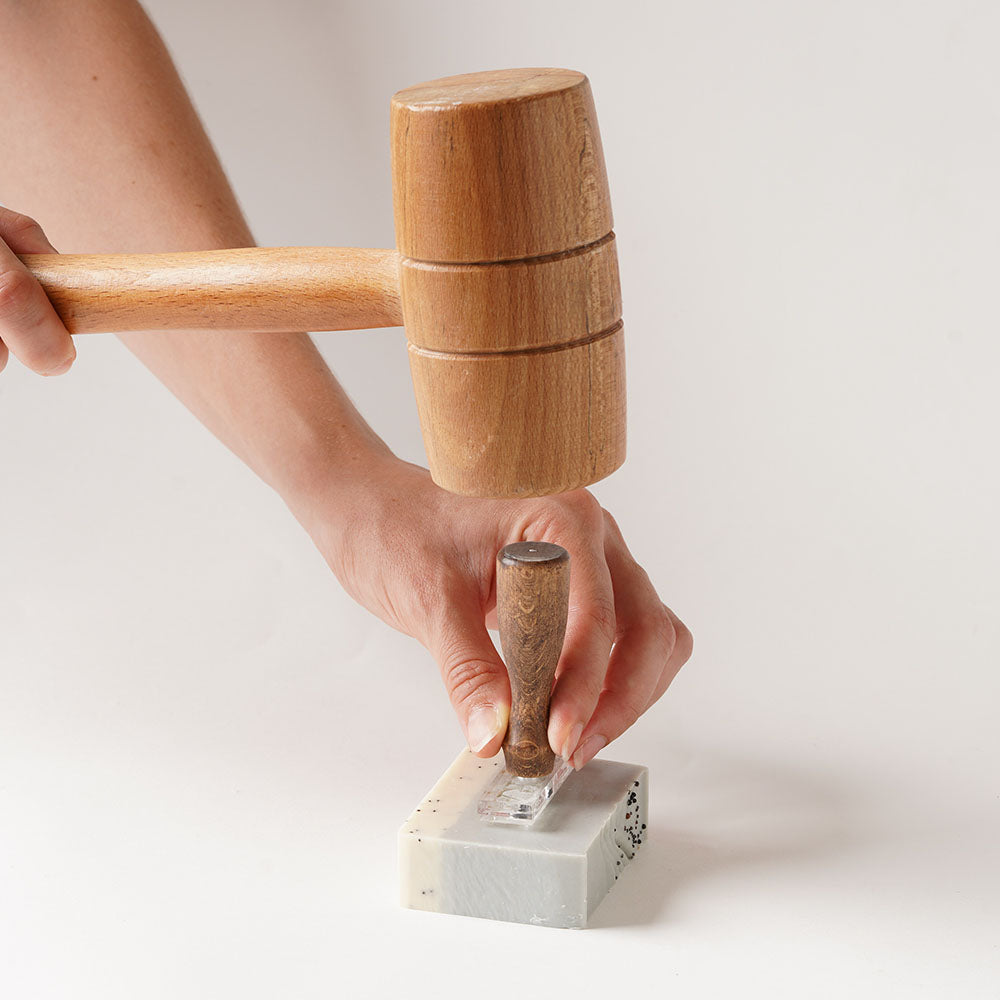 Custom soap stamp creating clear brand impressions on handmade soap bars