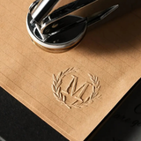Custom embosser with personalized logo for official certification seal and book stamping